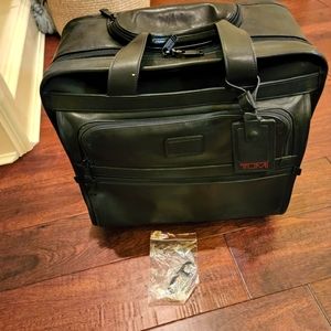 Leather Tumi rolling briefcase